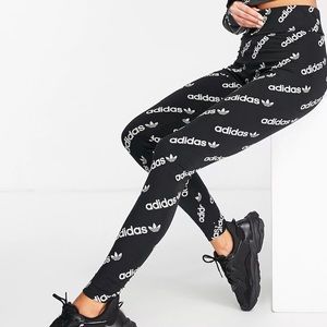 Adidas Originals Logomania repeat logo leggings in black